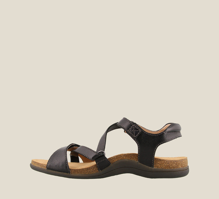 Inside angle of Grand Z Black Z strap sandal on our cork footbed featuring soft leather complete adjustability metal rivets and a rubber outsole. - size 6