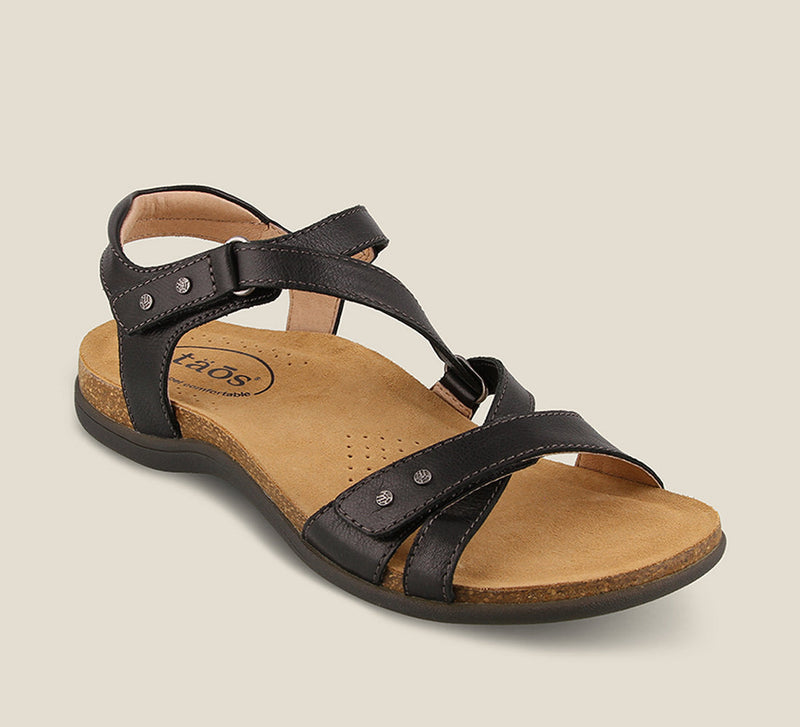 3/4 Angle of Grand Z Black Z strap sandal on our cork footbed featuring soft leather complete adjustability metal rivets and a rubber outsole. - size 6