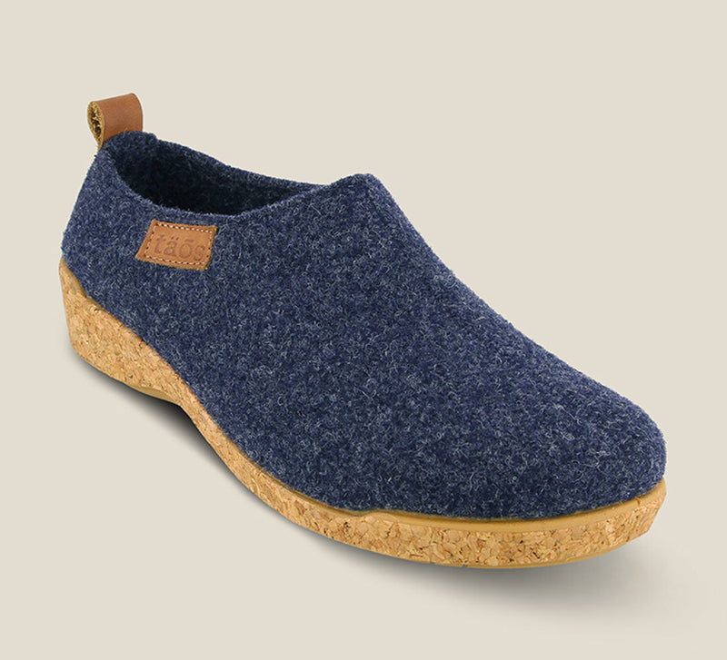 3/4 Angle of Wonderwool Navy Wool slip on with cork detail a supportive footbed and rubber outsole. - size 36