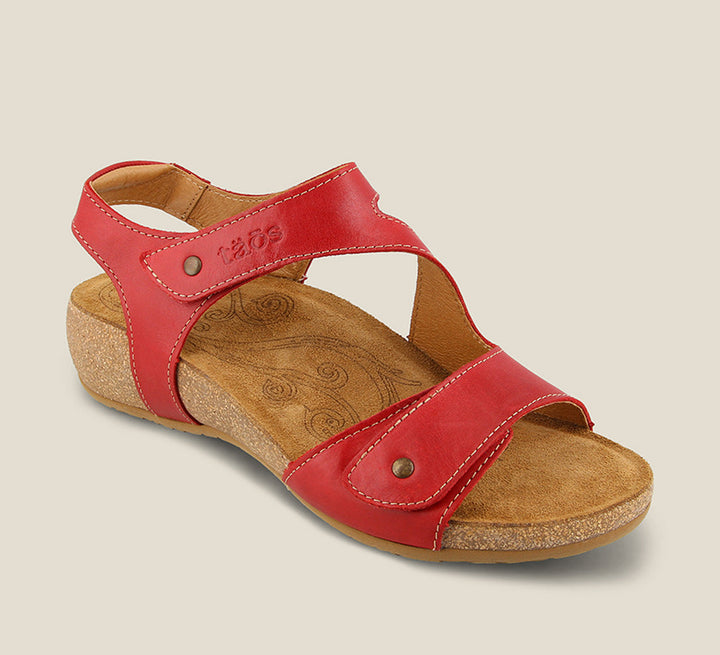 3/4 Angle of Lovely Red adjustable leather sandal with two hook and loop straps lightweight cork footbed. Featuring hardware embellishments and a rubber outsole. - size 36