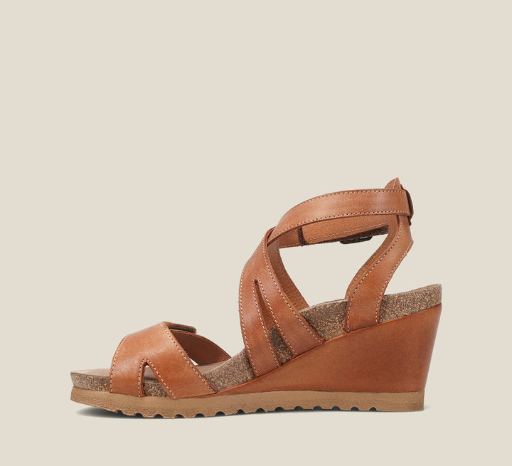 side Angle of Xcellent Caramel leather wedge featuring exceptional arch & metatarsal support with a rubber outsole