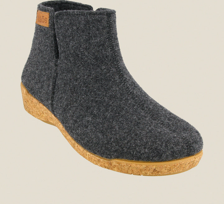 3/4 Angle of Woolly Boolly Charcoal Wool slip on bootie with cork detail a supportive footbed and rubber outsole. - size 36