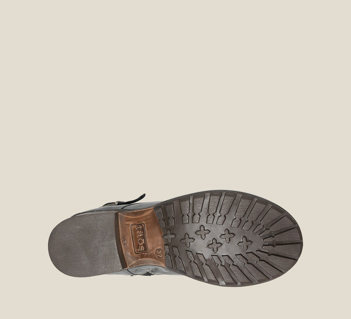 Outsole image of Crave Steel Leather &  boot with buckle & an inside zipper lace-up adjustability.