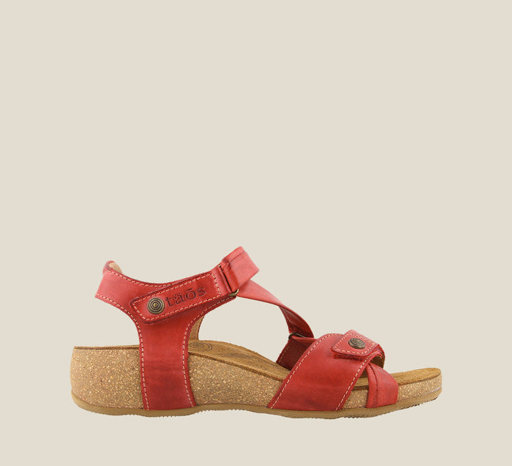 Outside angle of Universe Red adjustable leather sandal with two hook and loop straps lightweight cork footbed. Featuring hardware embellishments and a rubber outsole. - size 36