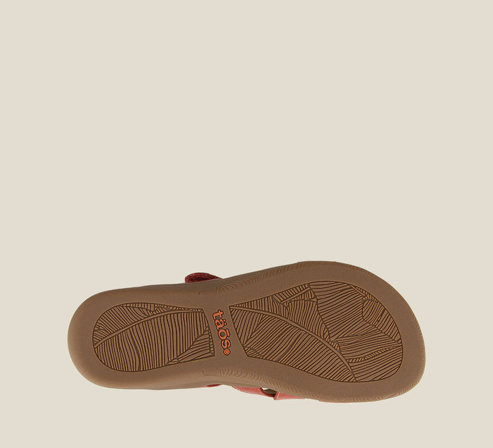 Outsole angle of Double U Red Casual leather slide sandal with metal rivets hook and loop straps and a rubber outsole. - size 6