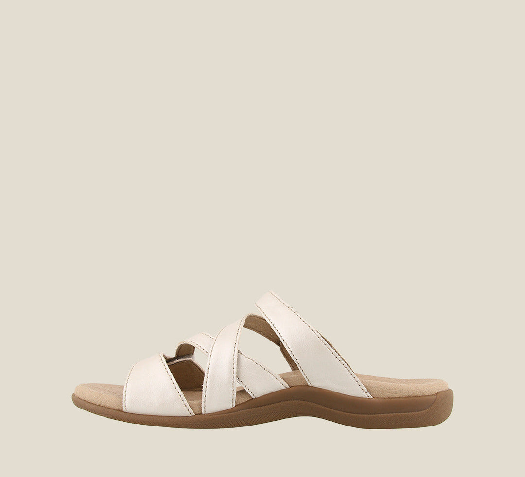 Inside angle of Double U White Pearl Casual leather slide sandal with metal rivets hook and loop straps and a rubber outsole. - size 6